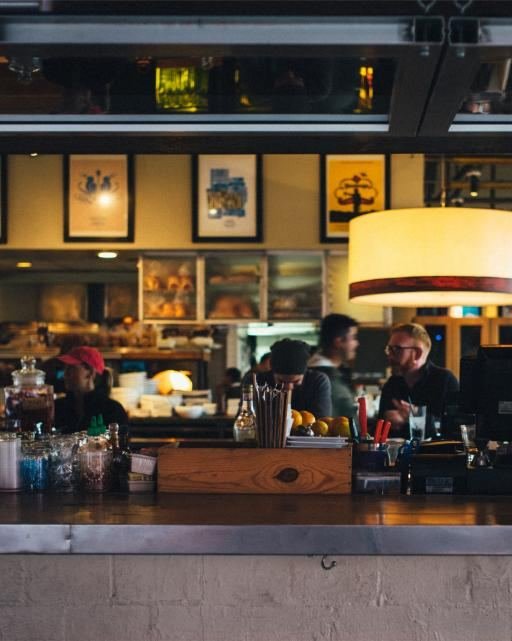 A busy neighborhood restaurant in the evening
